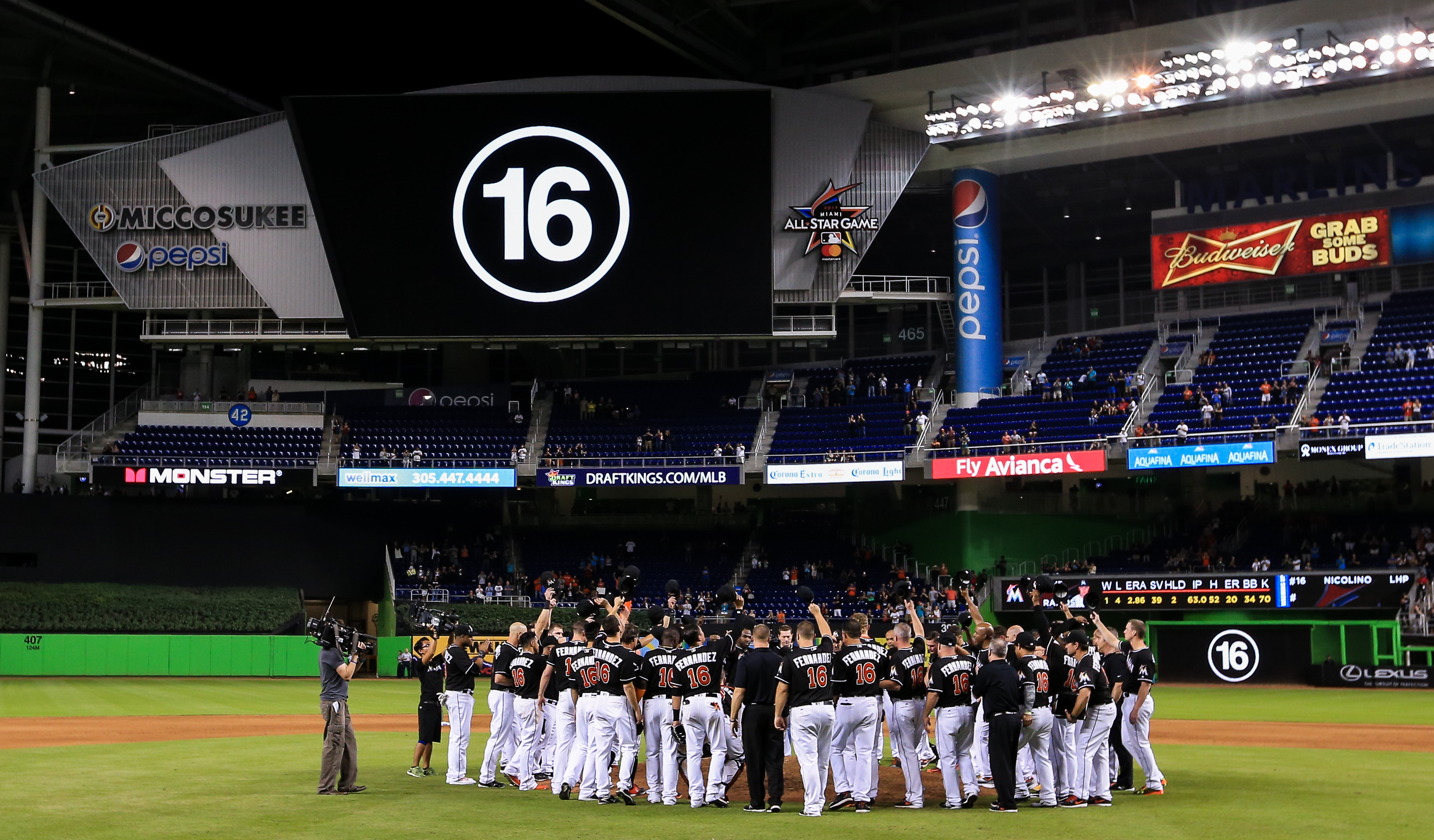 MIAMI, FL - SEPTEMBER 26: Miami Marlins players all wearing jerseys bearing the number 16 and name Fernandez honor the late Jose Fernandez after the game against the New York Mets at Marlins Park on September 26, 2016 in Miami, Florida. (Photo by Rob Foldy/Getty Images) ORG XMIT: 607685695 ORIG FILE ID: 610610532