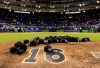 MIAMI, FL - SEPTEMBER 26: Miami Marlins leave their hats on the pitching mound to honor the late Jose Fernandez after the game against the New York Mets at Marlins Park on September 26, 2016 in Miami, Florida. (Photo by Rob Foldy/Getty Images) ORG XMIT: 607685695 ORIG FILE ID: 610610564