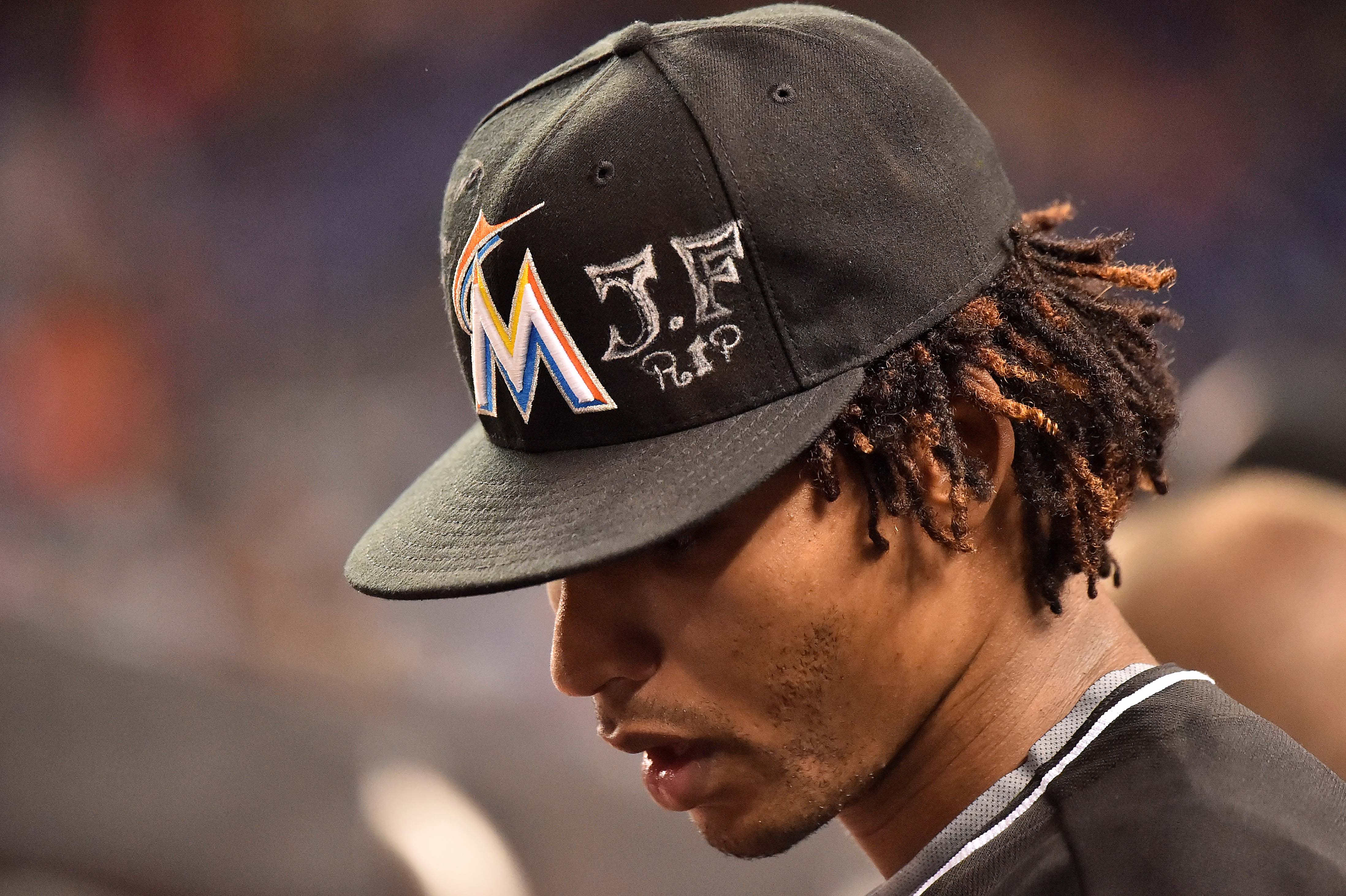 Sep 26, 2016; Miami, FL, USA; Miami Marlins relief pitcher Jose Urena wears a hat with a memorial for teammate starting pitcher Jose Fernandez in the game against the New York Mets at Marlins Park. Mandatory Credit: Jasen Vinlove-USA TODAY Sports ORG XMIT: USATSI-262928 ORIG FILE ID: 20160926_jfv_bv1_047.jpg