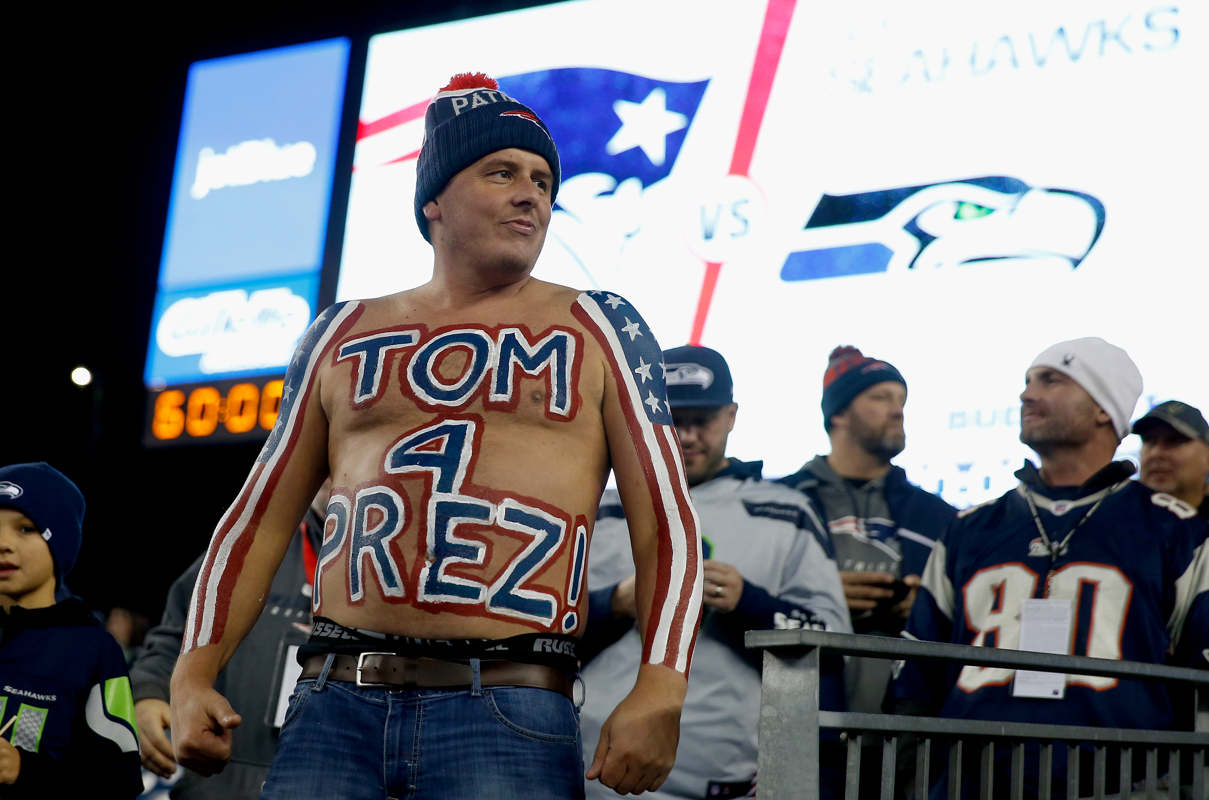 Patriots fan uses body paint to make case for Tom Brady for