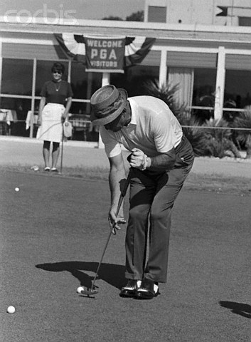 17 Jul 1968, San Antonio, Texas, USA --- Sam Snead, looking more like a croquet player with his new putting prior to playing a round over the Pecan Valley Country Club course, where the 50th PGA Championships in 1942, 1949 and 1951, despite the 54 years of age can be considered a contender for this year's championship by virtue of his second place finish in the Milwaukee Open last week. --- Image by © Bettmann/CORBIS