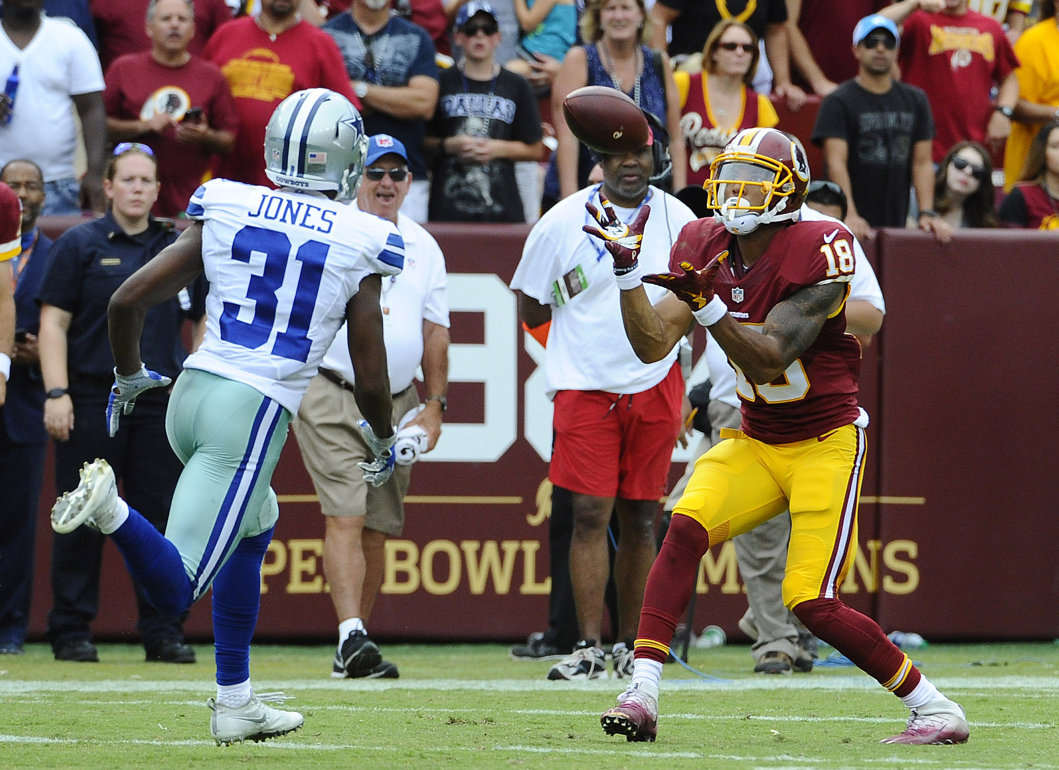 Sep 18, 2016; Landover, MD, USA; Washington Redskins wide receiver Josh Doctson (18) makes a reception as Dallas Cowboys free safety Byron Jones (31) looks on during the second half at FedEx Field. The Dallas Cowboys won 27 - 23. Mandatory Credit: Brad Mills-USA TODAY Sports