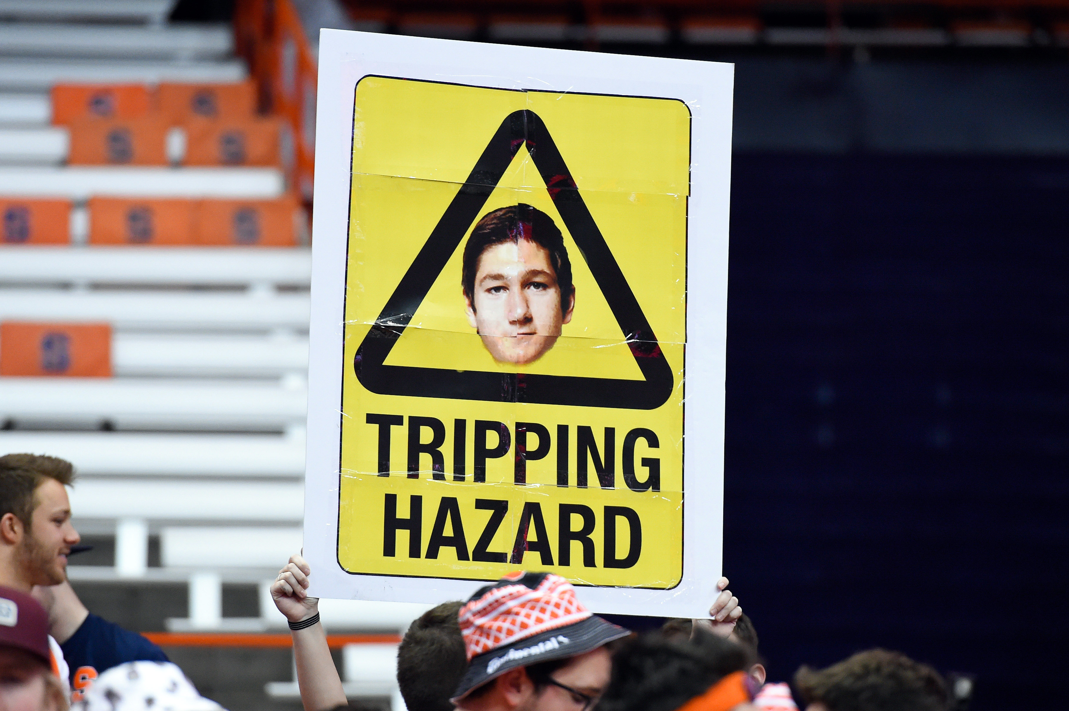Feb 22, 2017; Syracuse, NY, USA; A Syracuse Orange fan holds a sign for Duke Blue Devils guard Grayson Allen (not pictured) prior to the game at the Carrier Dome. Mandatory Credit: Rich Barnes-USA TODAY Sports ORG XMIT: USATSI-336548 ORIG FILE ID:  20170222_pjc_ai8_678.JPG