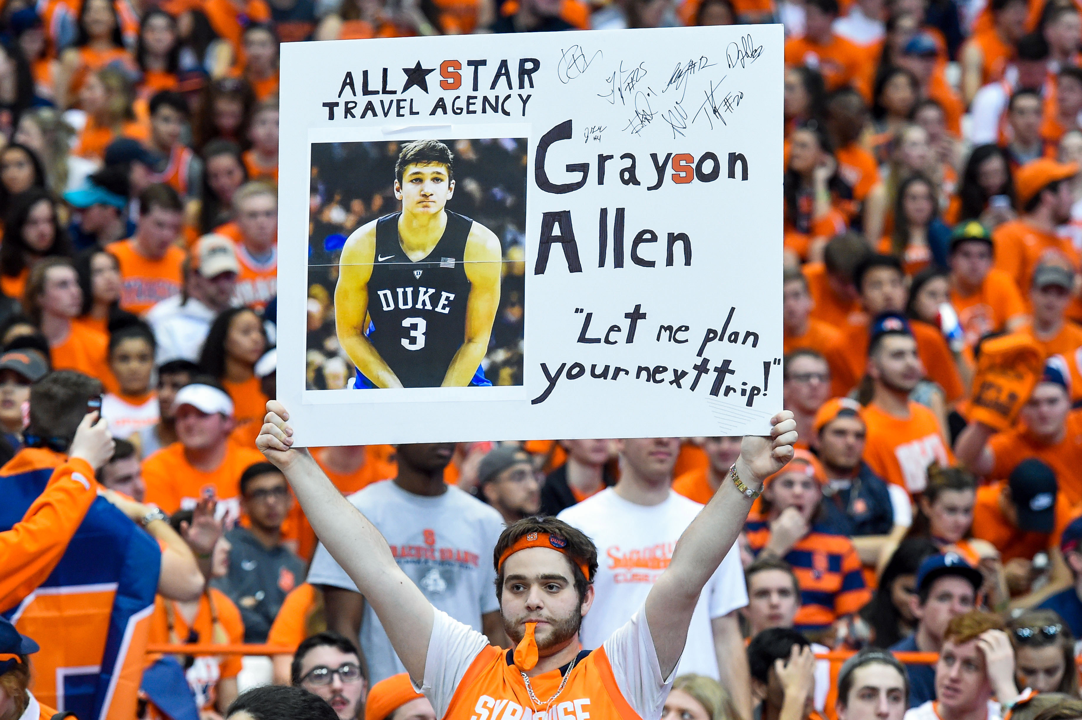 Feb 22, 2017; Syracuse, NY, USA; A Syracuse Orange fan holds a sign for Duke Blue Devils guard Grayson Allen (not pictured) prior to the game at the Carrier Dome. Mandatory Credit: Rich Barnes-USA TODAY Sports ORG XMIT: USATSI-336548 ORIG FILE ID:  20170222_pjc_ai8_697.JPG