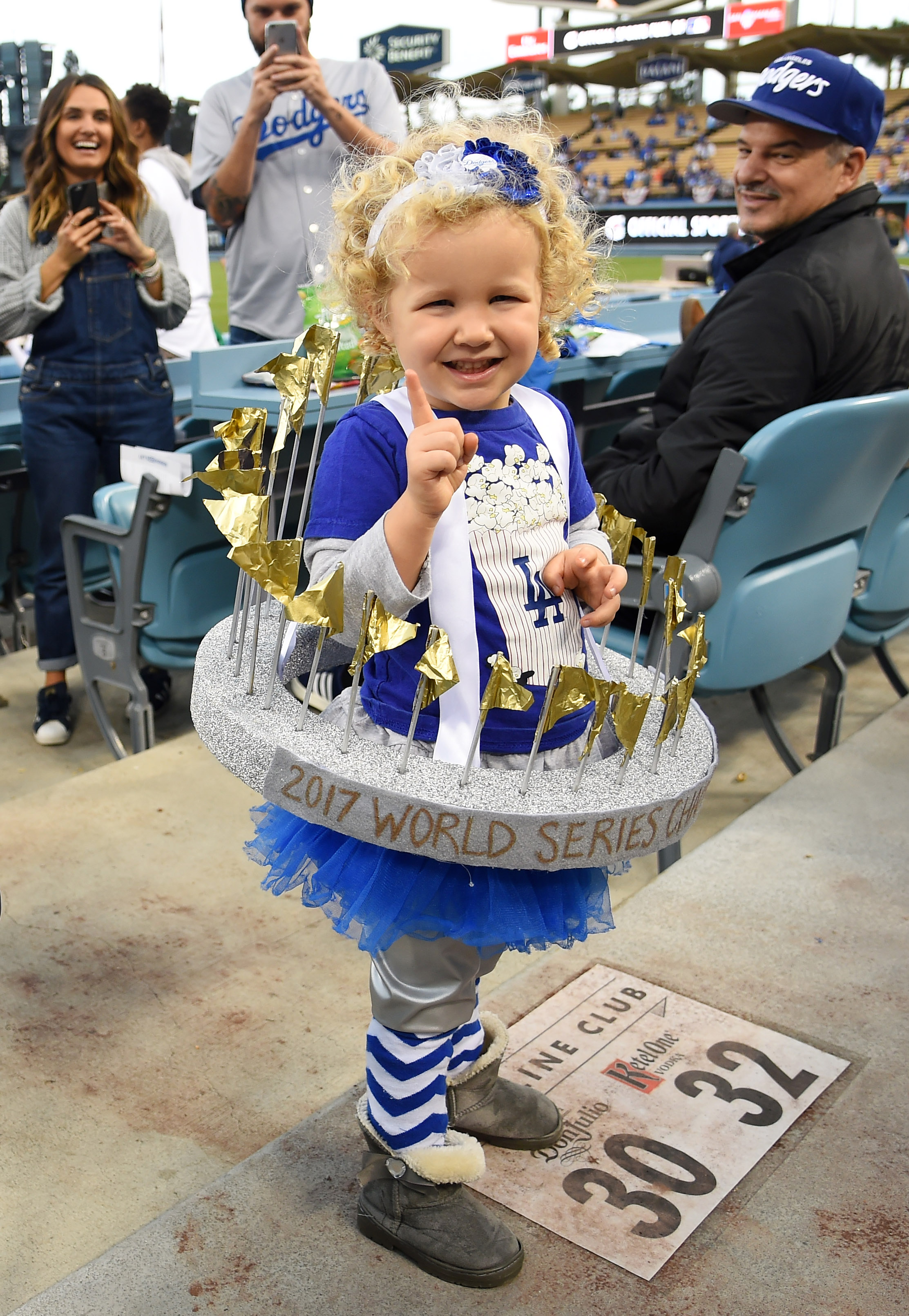 Dodgers fans are seen dressed up in costumes for halloween prior