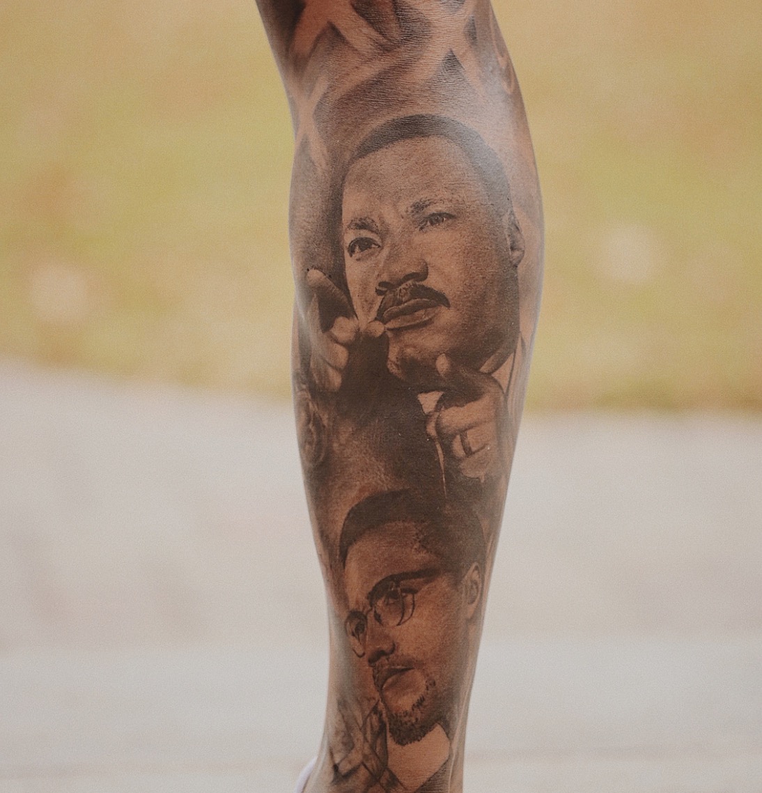 Odell Beckham Jr.'s black and grey leg sleeve tattoo.