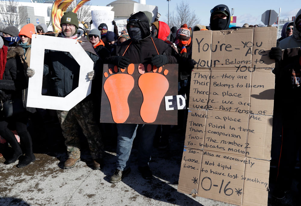 Sad Browns fans get creative with their paper bags and signs