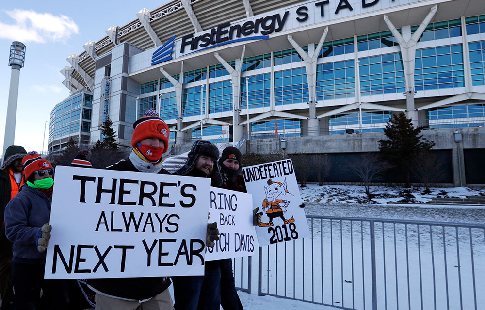 Sad Browns fans get creative with their paper bags and signs