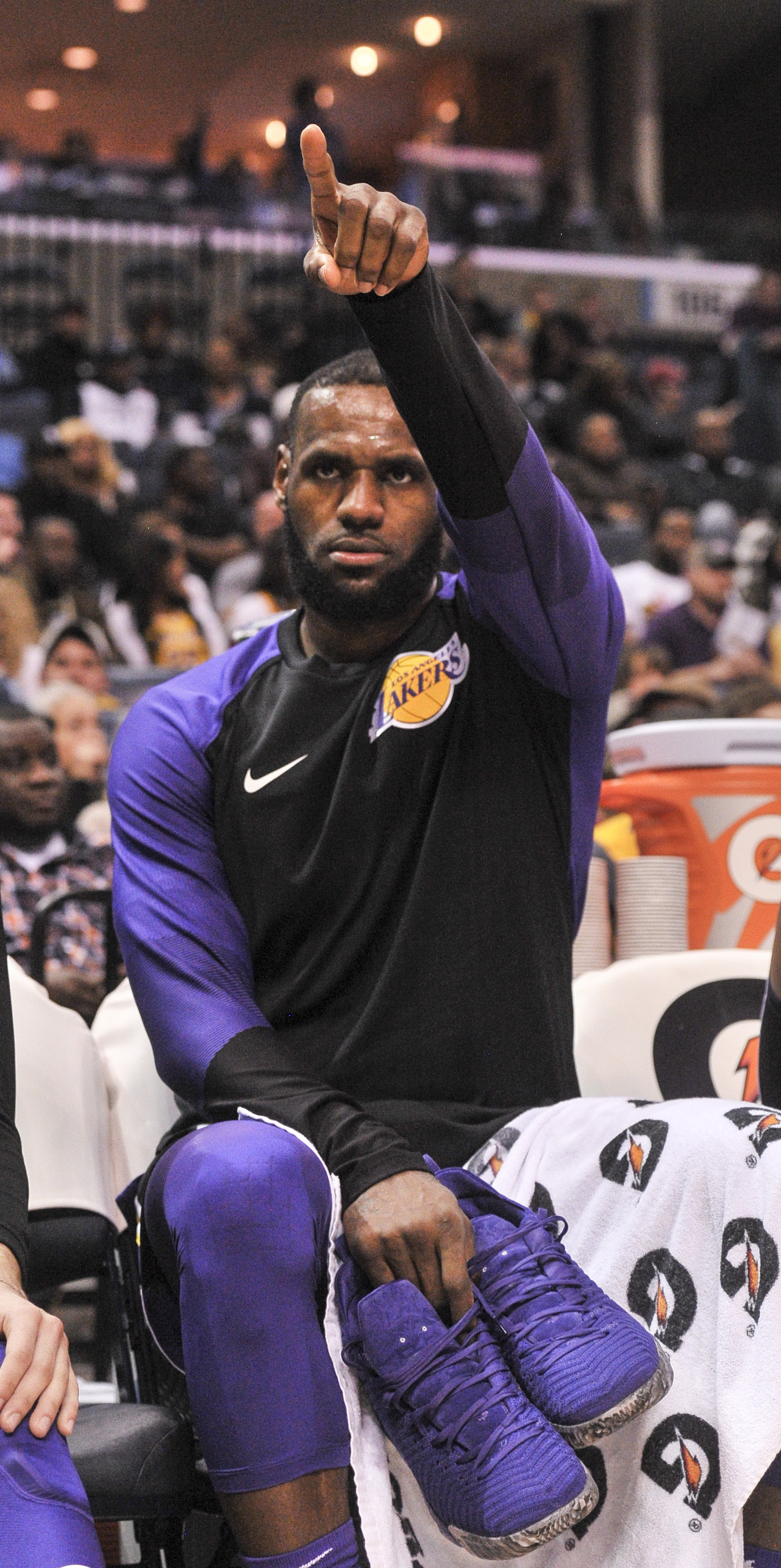 The names of Los Angeles Lakers' LeBron James' kids are written on his shoes  during an NBA basketball game against the Memphis Grizzlies Sunday, Dec. 23,  2018, in Los Angeles. (AP Photo/Marcio