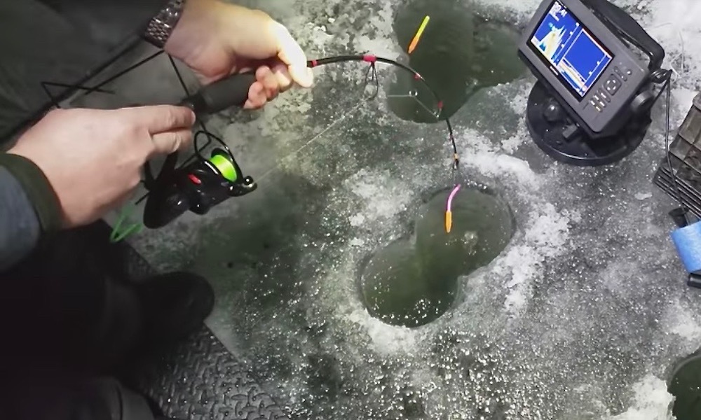 Angler catches record sturgeon through small hole in ice