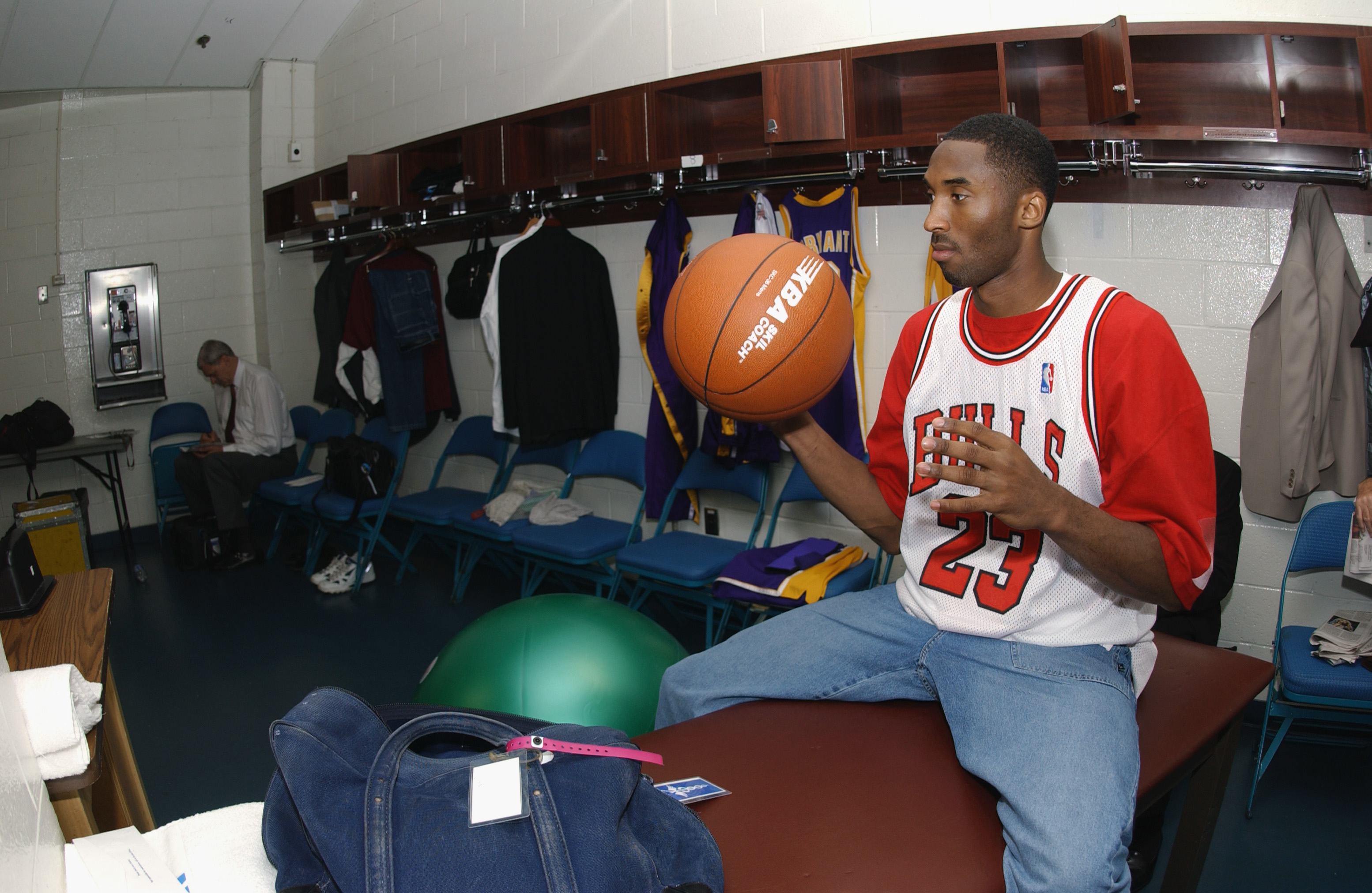 Kobe Bryant wearing number 8 jersey and Air Jordan Retro VIII PE