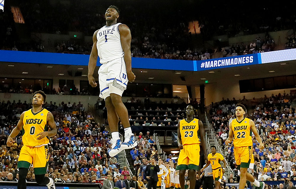 Zion Williamson is seemingly floating in this incredible photo of R.J.  Barrett's reverse dunk - Article - Bardown