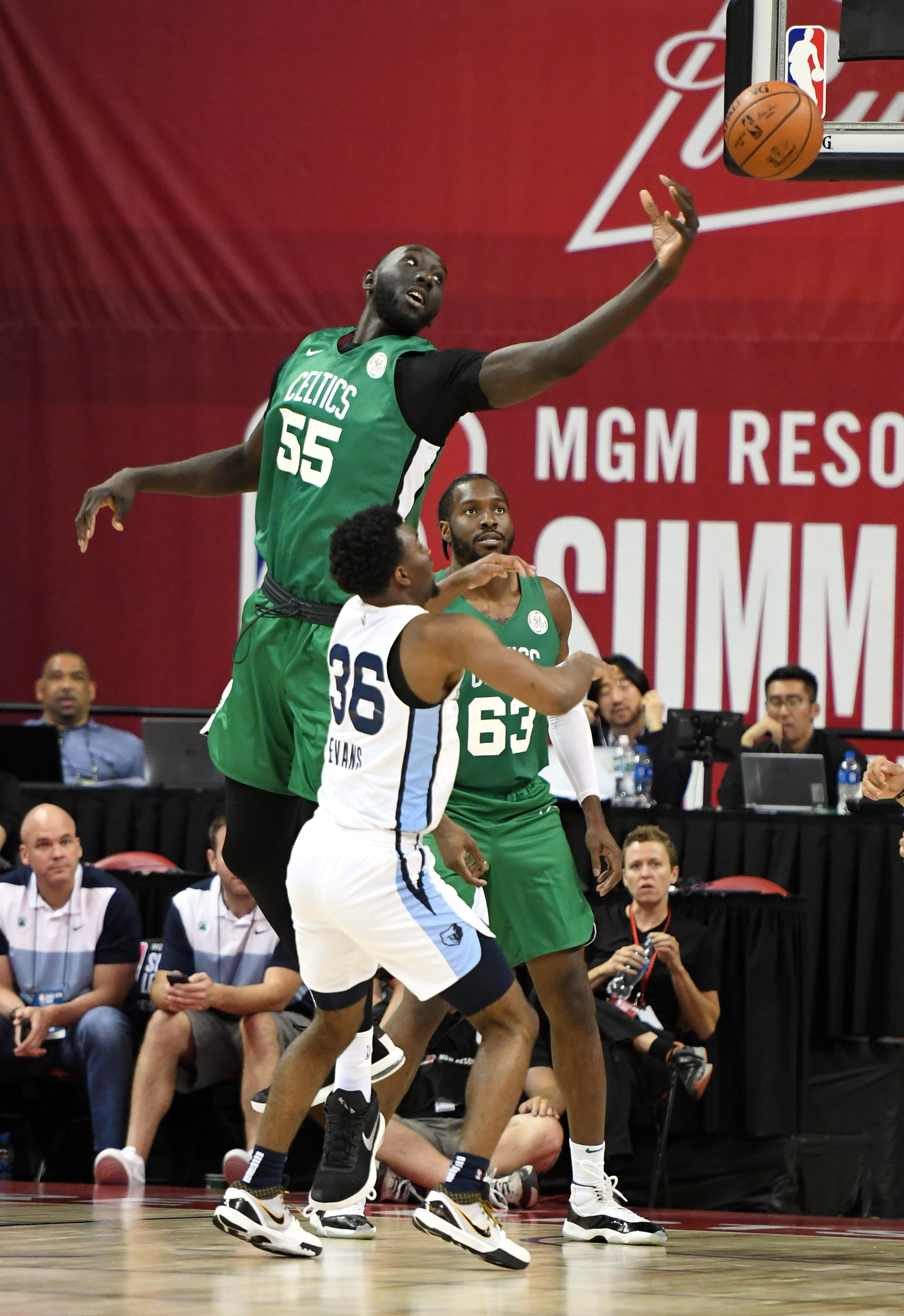 NBA Tacko Fall towering over NBA players photos