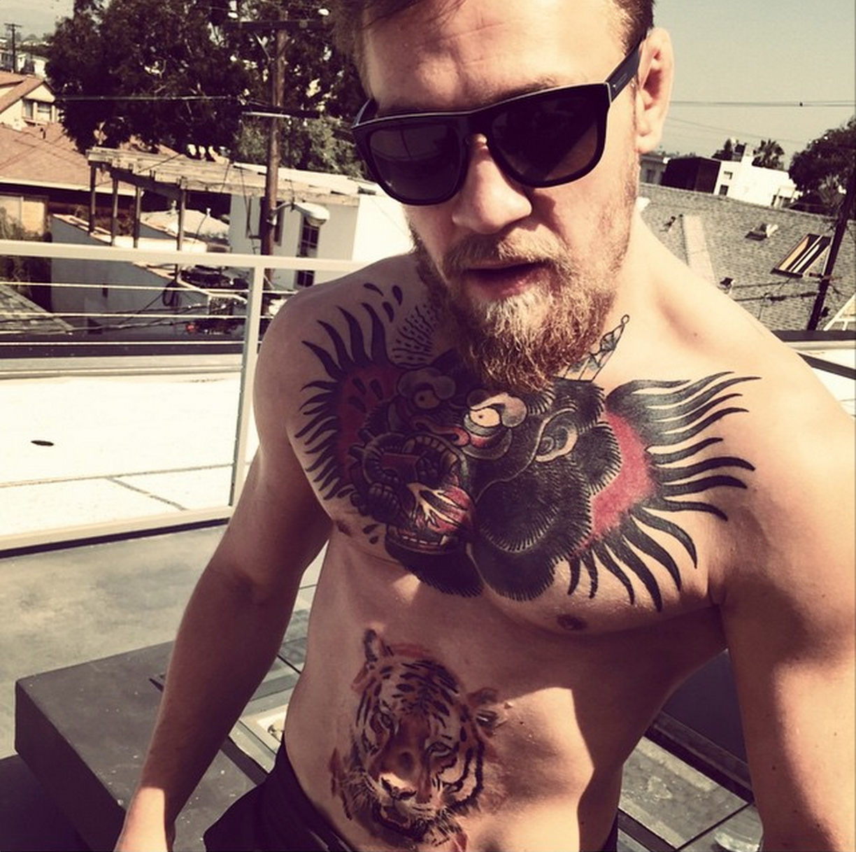 Conor McGregor lives up to notorious nickname by adding more tattoos to  his heavilyinked body  Daily Mail Online