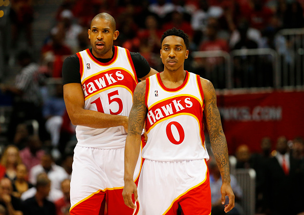 ATLANTA, GA - MAY 22: Jeff Teague #0 and Al Horford #15 of the Atlanta Hawks react in the second quarter against the Cleveland Cavaliers during Game Two of the Eastern Conference Finals of the 2015 NBA Playoffs at Philips Arena on May 22, 2015 in Atlanta, Georgia. NOTE TO USER: User expressly acknowledges and agrees that, by downloading and or using this Photograph, user is consenting to the terms and conditions of the Getty Images License Agreement. (Photo by Kevin C. Cox/Getty Images)