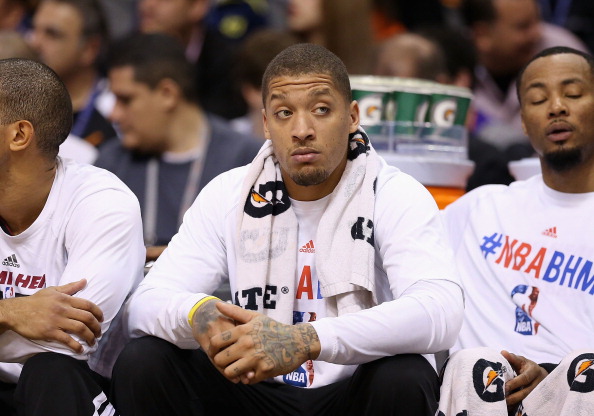 PHOENIX, AZ - FEBRUARY 11: Michael Beasley #8 of the Miami Heat during the NBA game against the Phoenix Suns at US Airways Center on February 11, 2014 in Phoenix, Arizona. The Heat defeated the Suns 103-97. NOTE TO USER: User expressly acknowledges and agrees that, by downloading and or using this photograph, User is consenting to the terms and conditions of the Getty Images License Agreement. (Photo by Christian Petersen/Getty Images)