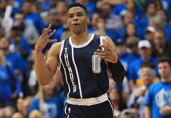 DALLAS, TX - APRIL 21: Russell Westbrook #0 of the Oklahoma City Thunder reacts after making a three-point shot against the Dallas Mavericks during game three of the Western Conference Quarterfinals of the 2016 NBA Playoffs at American Airlines Center on April 21, 2016 in Dallas, Texas. NOTE TO USER: User expressly acknowledges and agrees that, by downloading and or using this photograph, User is consenting to the terms and conditions of the Getty Images License Agreement. (Photo by Ronald Martinez/Getty Images)
