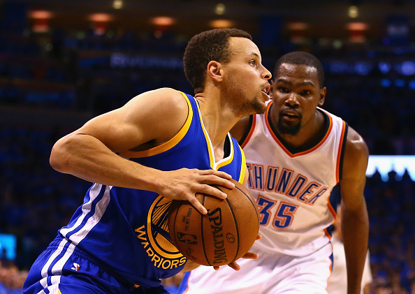 OKLAHOMA CITY, OK - MAY 28: Stephen Curry #30 of the Golden State Warriors drives against Kevin Durant #35 of the Oklahoma City Thunder during the fourth quarter in game six of the Western Conference Finals during the 2016 NBA Playoffs at Chesapeake Energy Arena on May 28, 2016 in Oklahoma City, Oklahoma. NOTE TO USER: User expressly acknowledges and agrees that, by downloading and or using this photograph, User is consenting to the terms and conditions of the Getty Images License Agreement. (Photo by Maddie Meyer/Getty Images)