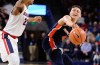 Feb 17, 2018; Spokane, WA, USA; Pepperdine Waves guard Colbey Ross (4) passes the basketball against Gonzaga Bulldogs guard Zach Norvell Jr. (23) during the second half at McCarthey Athletic Center. The Bulldogs won 81-76. Mandatory Credit: