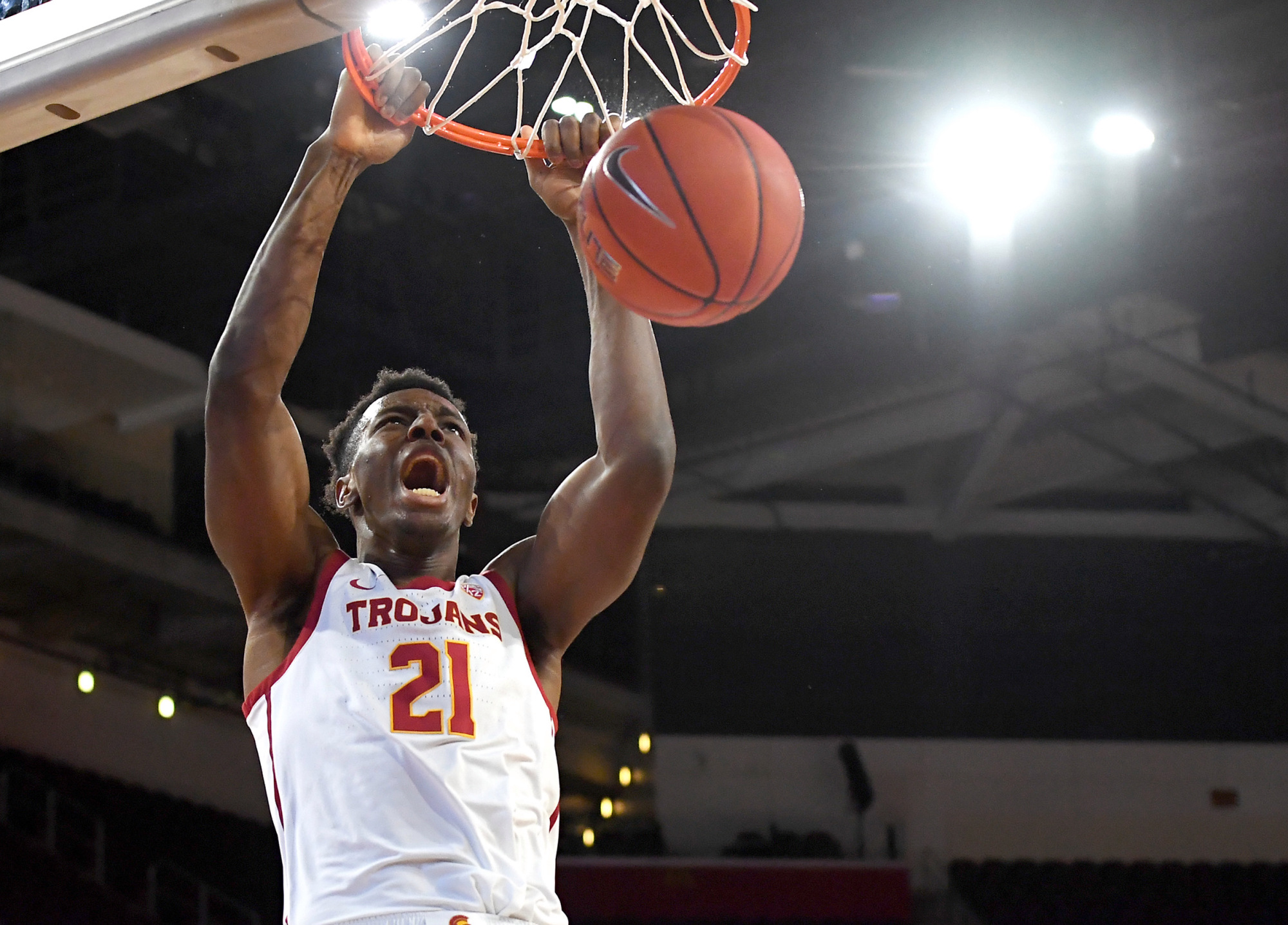 Jan 18, 2020; Los Angeles, California, USA; USC Trojans forward Onyeka Okongwu (21) dunks the ball in the first half of the game against the Stanford Cardinal at Galen Center.