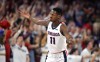 Feb 29, 2020; Spokane, Washington, USA; Gonzaga Bulldogs guard Joel Ayayi (11) celebrates a three-pointer against the St. Mary's Gaels in the second half at McCarthey Athletic Center. The Bulldogs won 86-76.