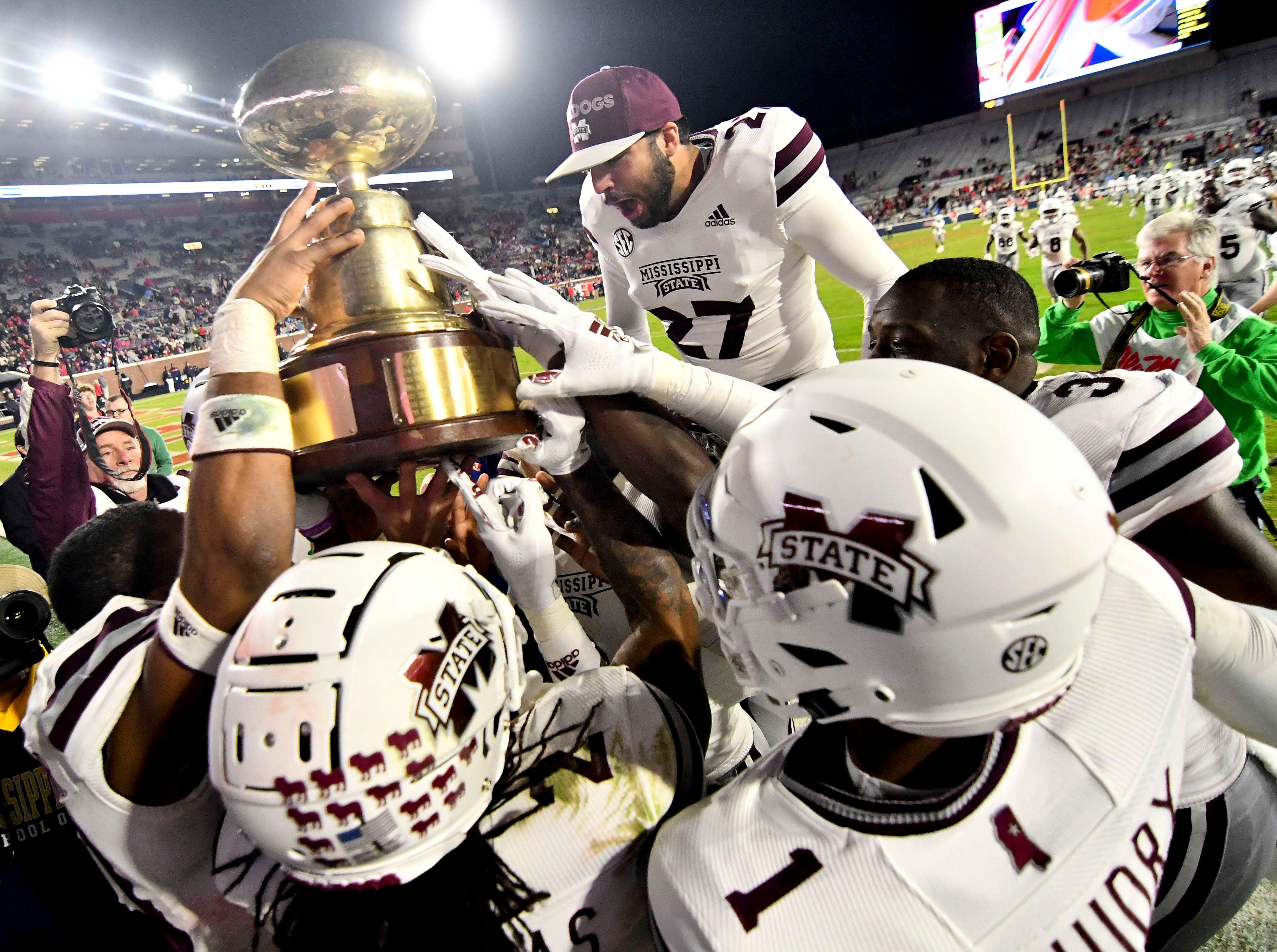 Behind dominant run game, Mississippi State beats Ole Miss 353 in