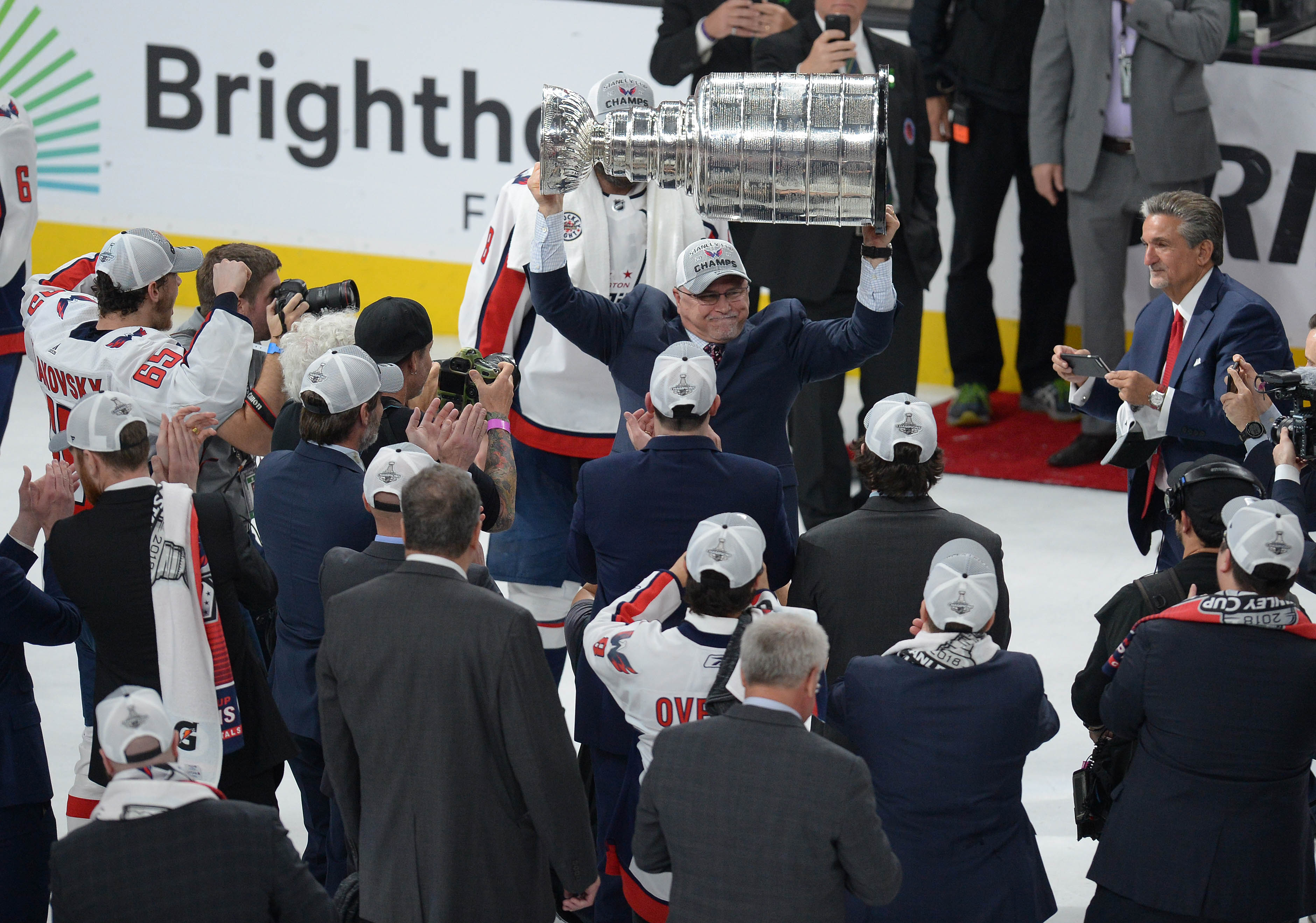 June 7, 2018; Las Vegas, NV, USA; Washington Capitals Barry Trotz lifts the Stanley Cup following game five of the 2018 Stanley Cup Final at T-Mobile Arena. Mandatory Credit: Gary A. Vasquez-USA TODAY Sports