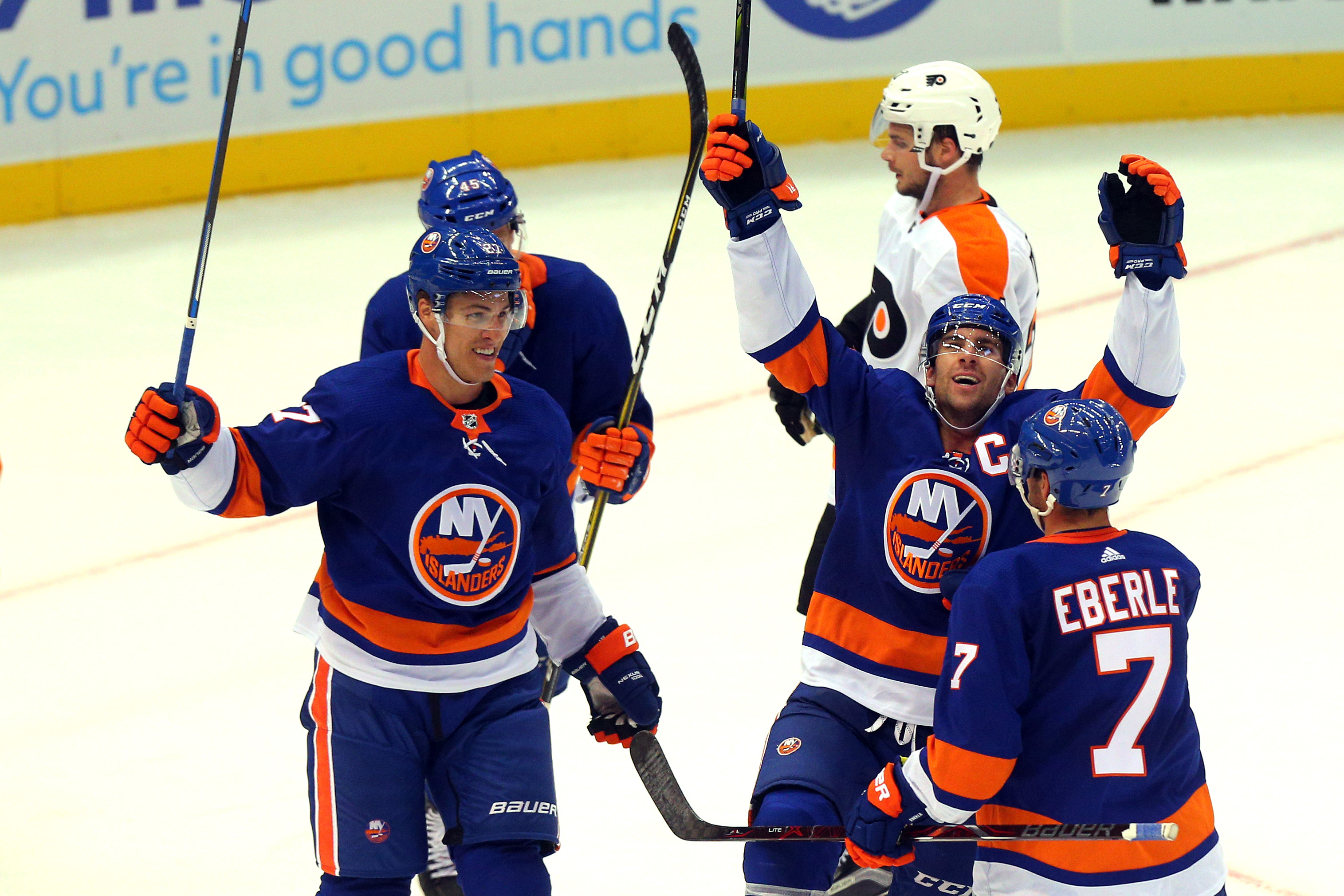 Sep 17, 2017; Uniondale, NY, USA; New York Islanders center John Tavares (91) celebrates his goal against the Philadelphia Flyers with center Anders Lee (27) and right wing Jordan Eberle (7) during the second period of a preseason game at NYCB Live at the Nassau Veterans Memorial Coliseum. Mandatory Credit: Brad Penner-USA TODAY Sports