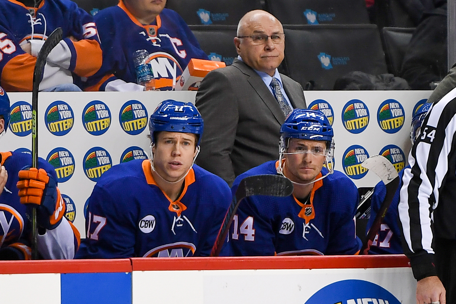 Nov 26, 2018; Brooklyn, NY, USA; New York Islanders Head Coach Barry Trotz (center) looks on from behind the bench against the Washington Capitals during the third period at Barclays Center. Mandatory Credit: Dennis Schneidler-USA TODAY Sports