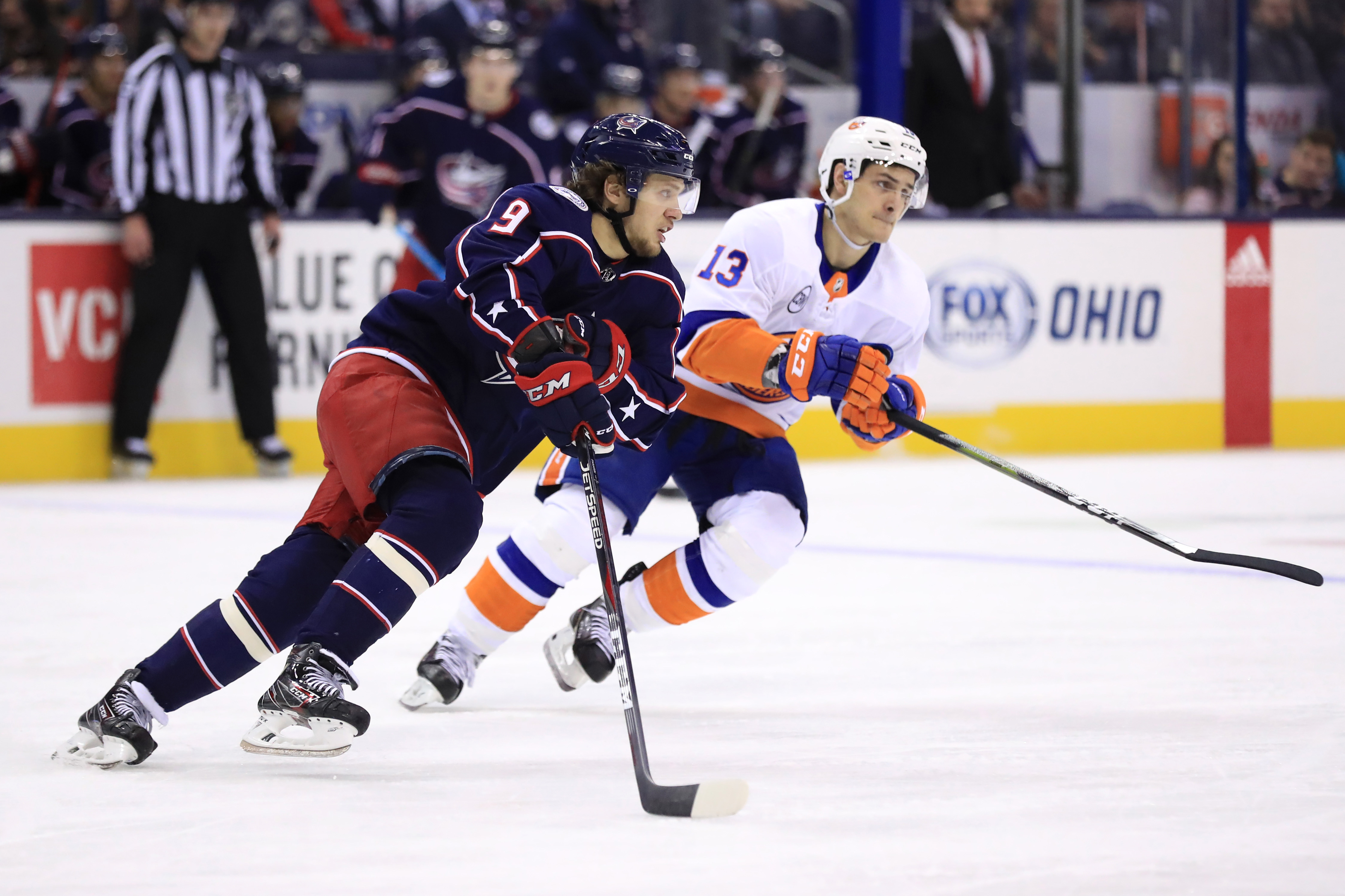 Feb 14, 2019; Columbus, OH, USA; Columbus Blue Jackets left wing Artemi Panarin (9) skates with the puck against New York Islanders center Mathew Barzal (13) in the third period at Nationwide Arena. Mandatory Credit: Aaron Doster-USA TODAY Sports