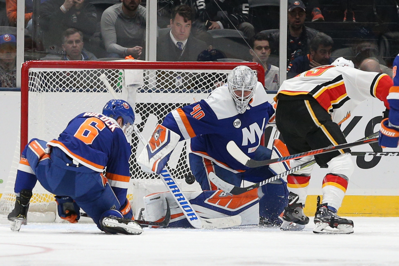 Feb 26, 2019; Uniondale, NY, USA; Calgary Flames left wing Matthew Tkachuk (19) scores a goal against New York Islanders goalie Robin Lehner (40) during the second period at Nassau Veterans Memorial Coliseum. Mandatory Credit: Brad Penner-USA TODAY Sports