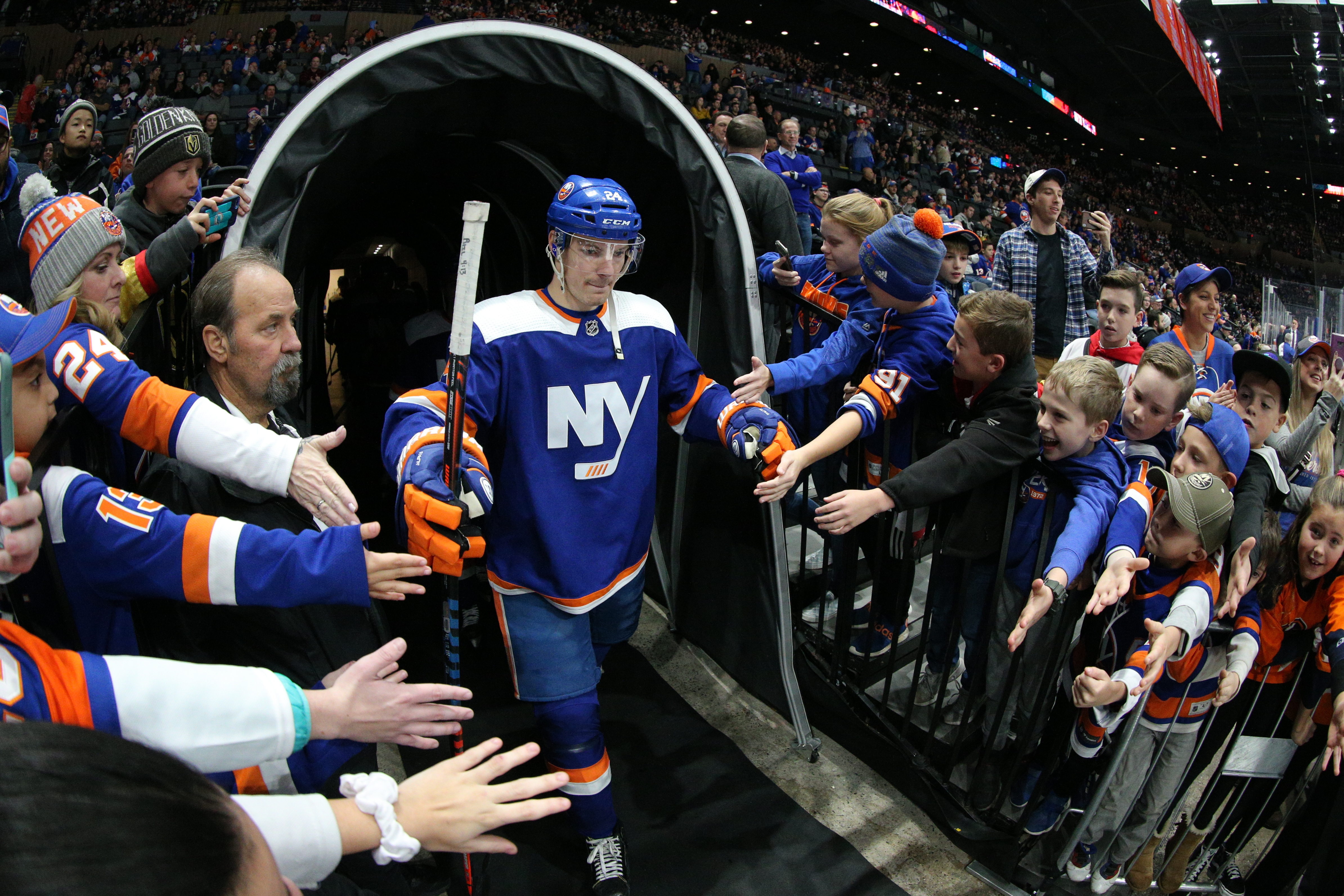 Dec 5, 2019; Uniondale, NY, USA; New York Islanders defenseman Scott Mayfield (24) walks to the ice prior to the game against the Vegas Golden Knights at Nassau Veterans Memorial Coliseum. Mandatory Credit: Brad Penner-USA TODAY Sports