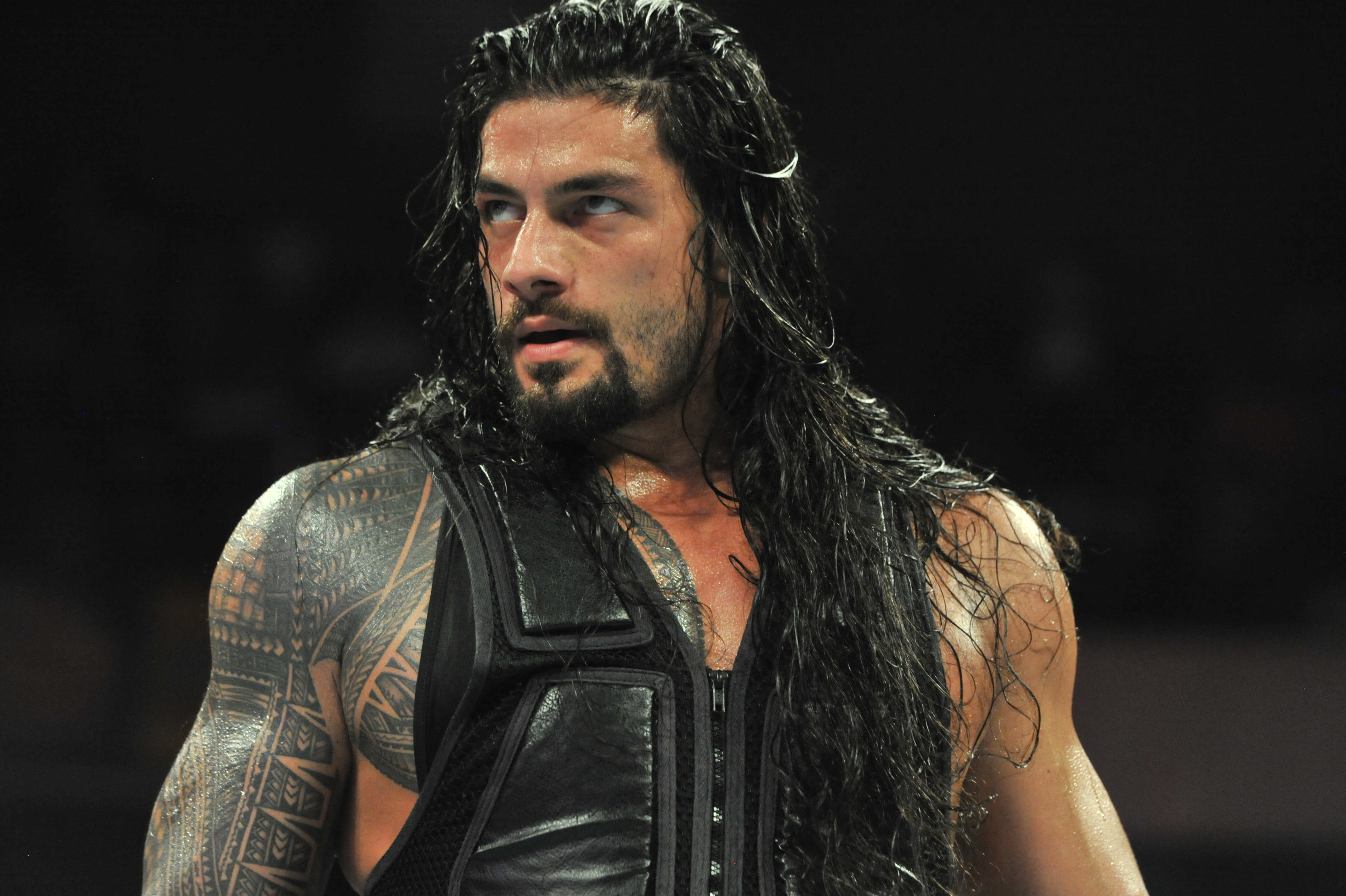 Former football star Joe Anoa'i now goes by Roman Reigns and is among the top stars in WWE (Photo: WWE).