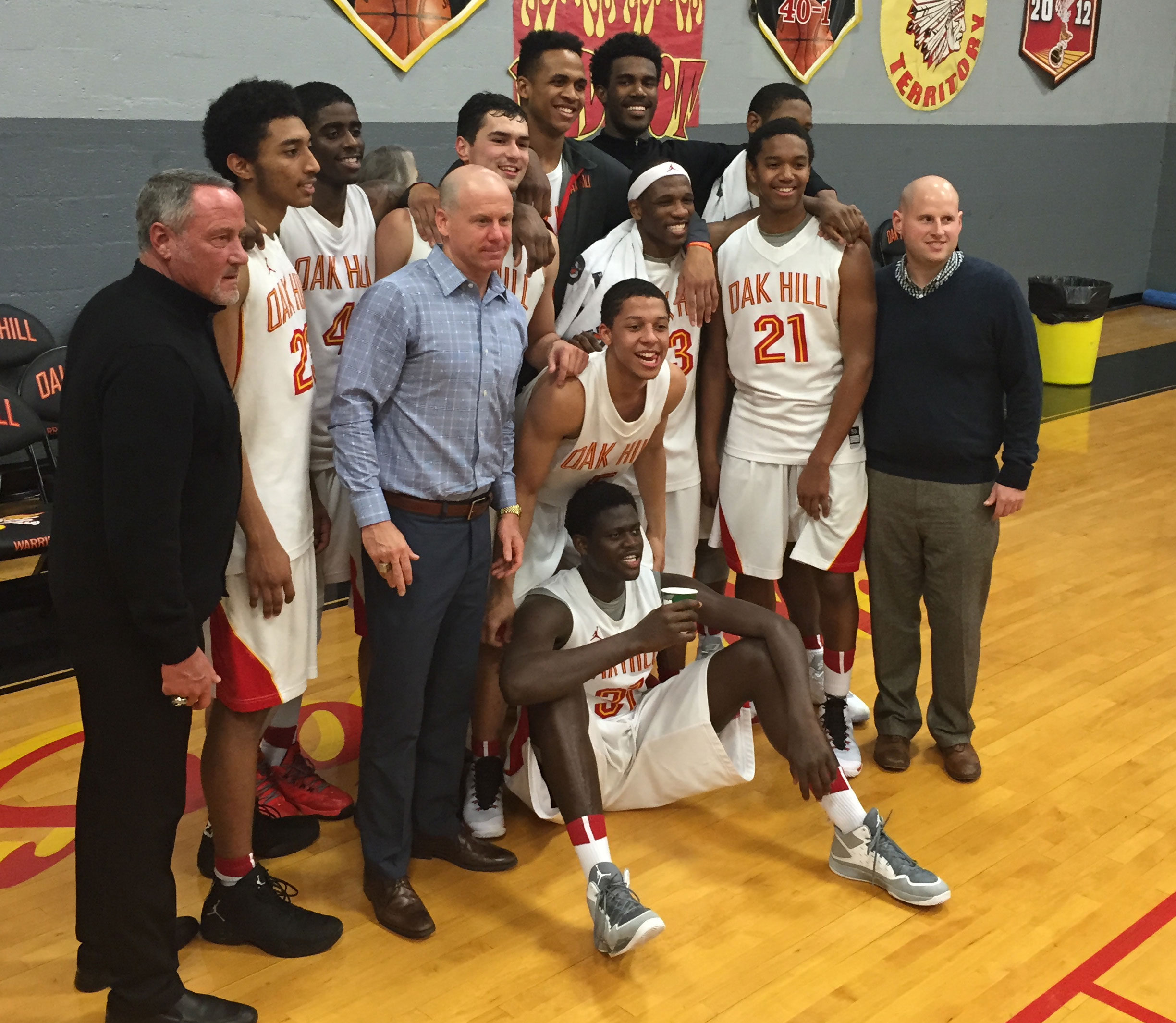 Oak Hill players and coaches pose for a photo after a victory to complete a 45-0 regular season (Photo: Jason Jordan/USA TODAY Sports)