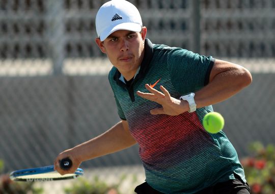 Indio's Eleazer Vazquez plays against Quinn Bush of Palm Desert High School as the Aztecs and Rajahs face off in a boys varsity tennis match on Tuesday, April 7, 2015 at Indio High School. (Photo: Crystal Chatham/The Desert Sun)