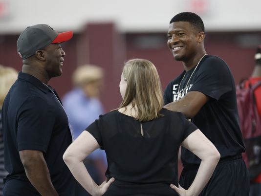 Tampa Bay Buccaneers head coach Lovie Smith chats with Jameis Winston during Florida State University's Pro Day at the Dunlap Training Facility on the school's campus Tuesday, March 31, 2015. (Photo: Joe Rondone/Democrat)