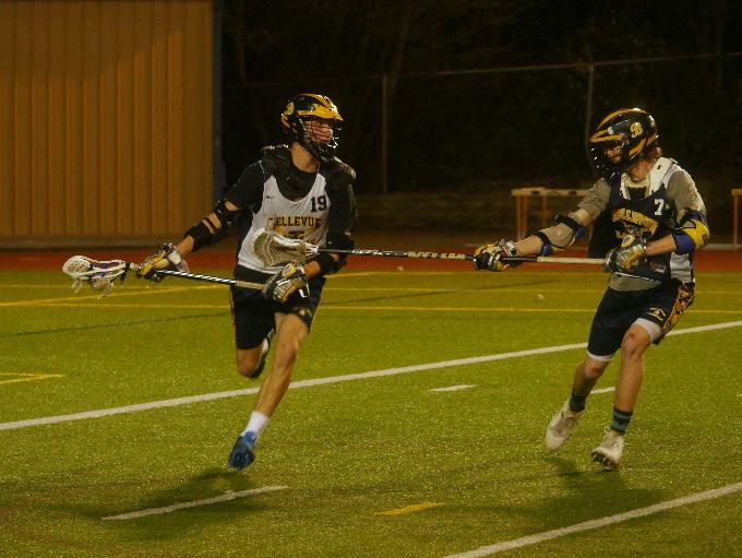 Bellevue lacrosse practices attack moves during a recent practice.