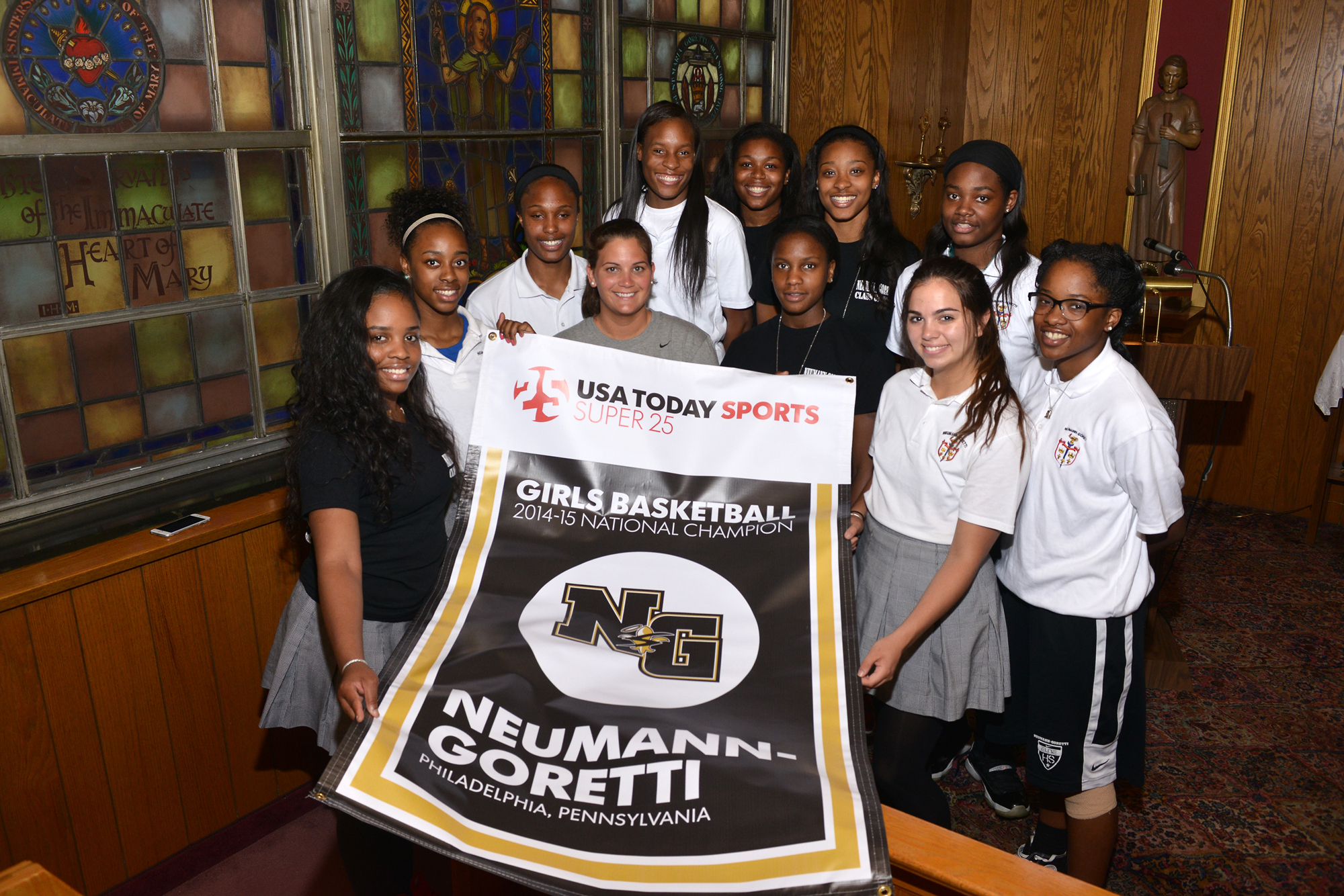 Neumann-Goretti receives Super 25 championship banner; coach Andrea