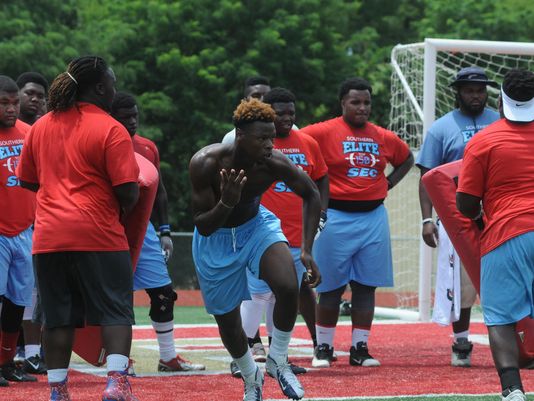 Dre Porter explodes out of his stance during a summer camp. (Photo: David Potter/The Oxford Eagle)