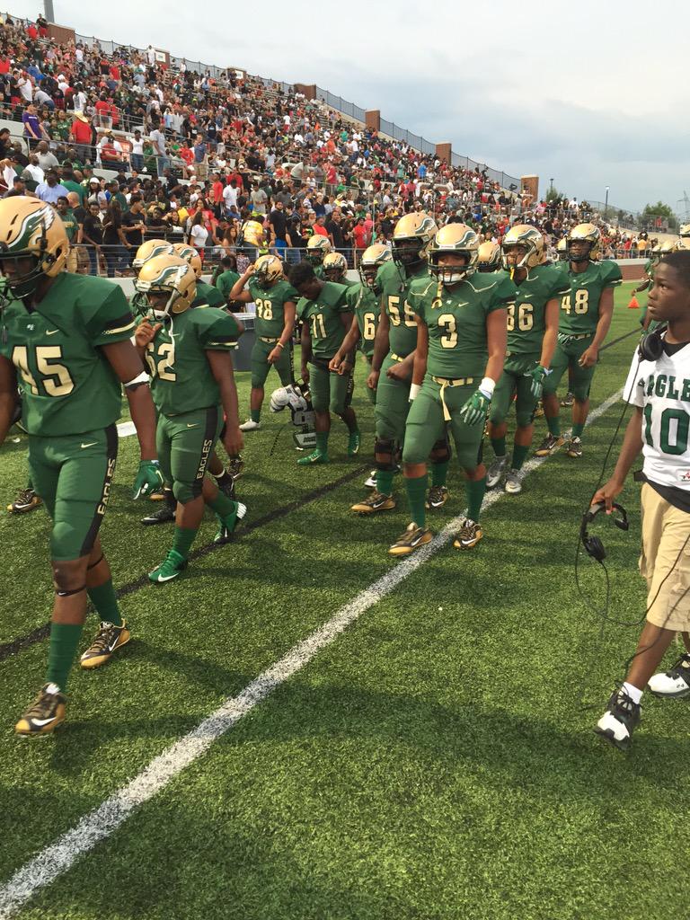 DeSoto players congratulate each other after their victory (Photo: Jimmy Isbell, TexasHSFootball.com)