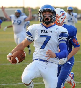 Charlestown's Syd Gieseking (7) celebrates as he scores the Pirate's first touchdown against Silver Creek on Friday at Silver Creek High School. Photo by David Lee Hartlage/Special to the Courier-journal. Sept. 18, 2015
