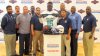Kendell Jones is surrounded as he shows off his Under Armour All-America jersey (Photo: Intersport)