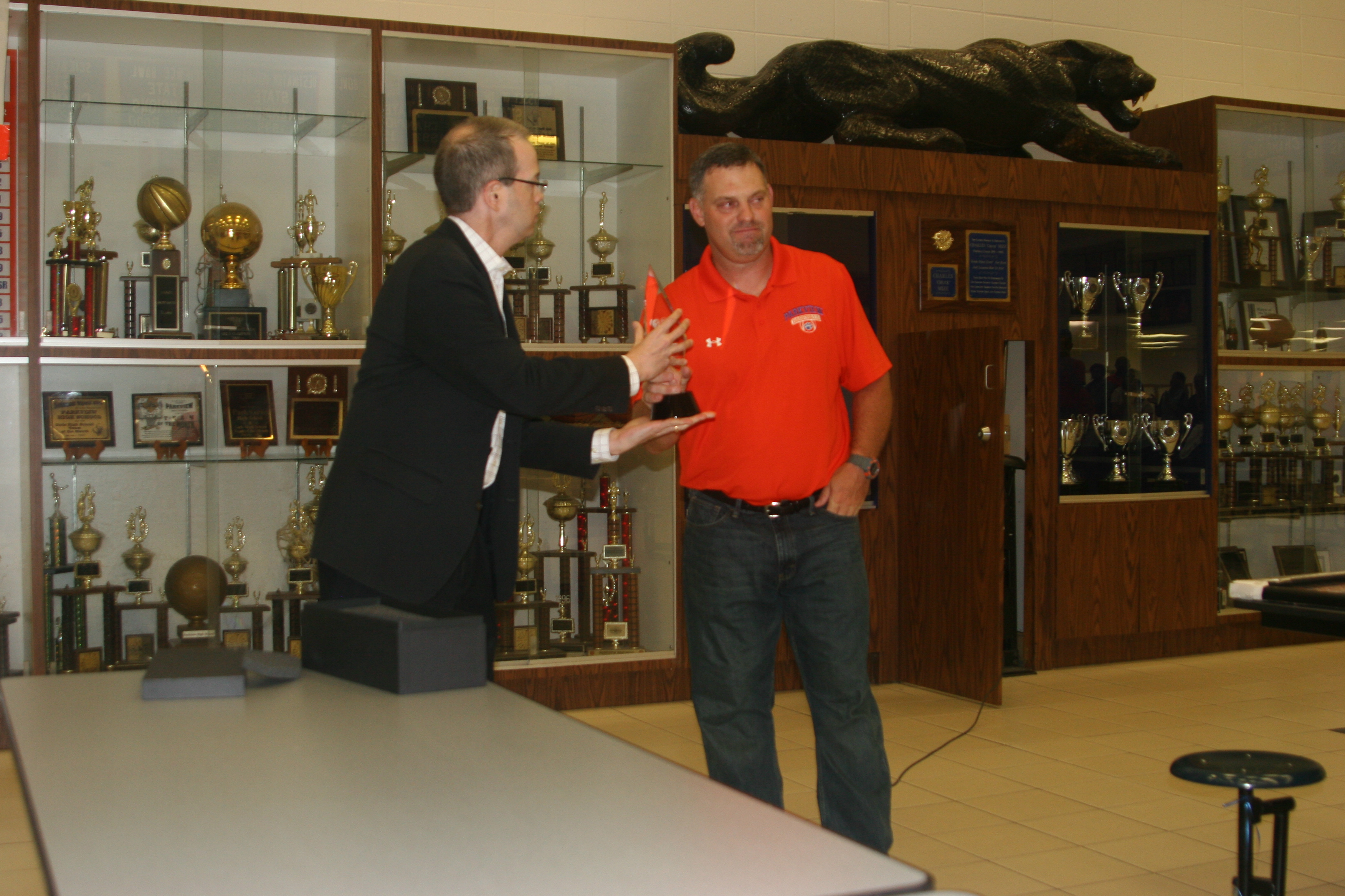 Parkview baseball coach Chan Brown receives the ALL-USA Coach of the Year trophy from Josh Barnett, director of content for USA TODAY High School Sports (Photo: Parkview High)