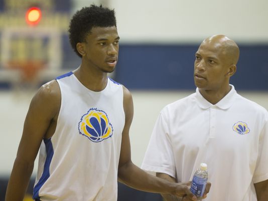 Assistant coach Marvin Bagley Jr. (right) and his son Marvin Bagley III talk during an exhibition game against Phoenix Community College at Phoenix Community College in Phoenix on October 8, 2015. (Photo: Patrick Breen/azcentral sports)