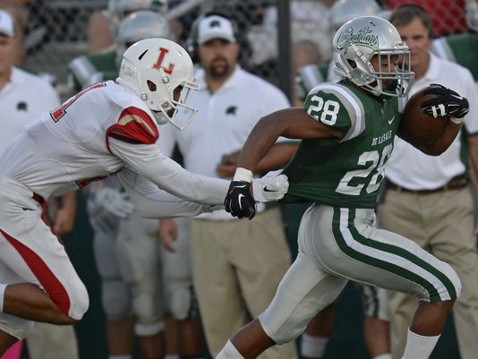 De La Salle's Antoine Custer, No. 28, runs with the ball in game in September. De La Salle has been a national football powerhouse for many years. (Photo: Jose Carlos Fajardo, Bay Area News Group)