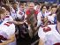 Center Grove High School head coach Eric Moore celebrates with his team after winning the IHSAA Class 6A state championship (Photo: Doug McSchooler / For The Indianapolis Star)