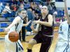Stuarts Draft's Rachel Sauder tries to slip between Fort Defiance's Erin Henderson and Emily Humphries but Henderson strips the bats the ball away from her as she tried to reach the basket during a basketball game played in Fort Defiance on Friday, Dec. 11, 2015.