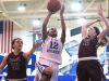 Fort Defiance's Tiffany Taylor takes the ball up as Stuarts Draft's Bailey Turner and Deborah Black guard during a basketball game played in Fort Defiance on Friday, Dec. 11, 2015.