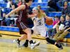 Fort Defiance's Emily Humphries changes directions with the ball while guarded by Stuarts Draft's Abby Rodgers during a basketball game played in Fort Defiance on Friday, Dec. 11, 2015.