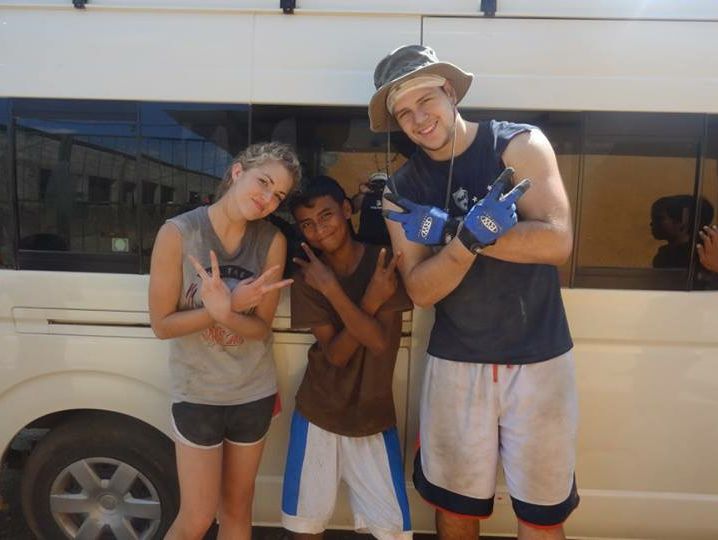 Port Huron's Alex Zmolik (right) poses for a picture while on a mission trip to Nicaragua last March.